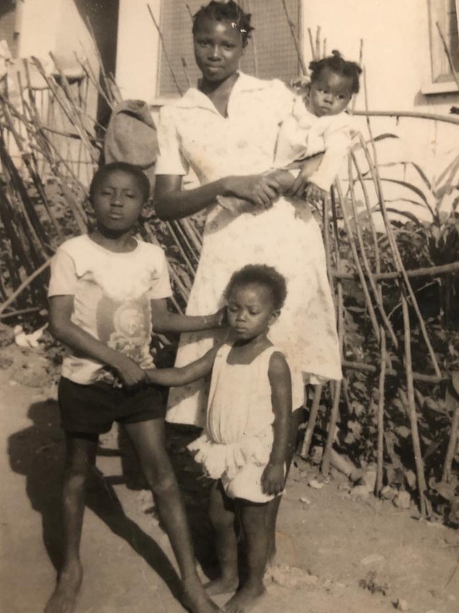 Aged seven with sisters Mina and Akua, and cousin Sasha in Tema, Ghana, 1979.