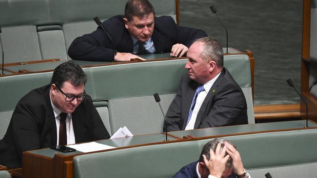 Llew O'Brien (top) speaks to Barnaby Joyce and George Christensen during Question Time in 2020. AAP Image/Lukas Coch) NO ARCHIVING