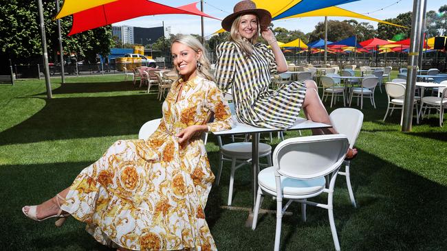 Abby Thomas and Amy Schapel dressed in Elle &amp; Elka in the Village Green at Adelaide Oval. Picture: Sarah Reed.