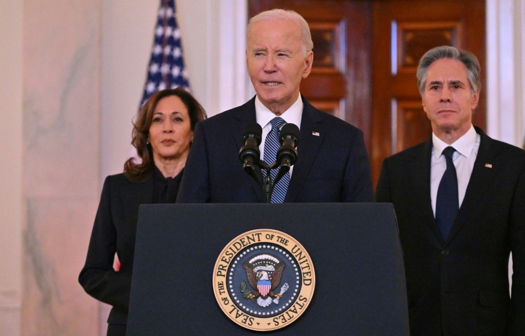 US President Joe Biden speaks about the Israel-Hamas ceasefire and hostage release deal in the Cross Hall of the White House, as Vice President Kamala Harris and Secretary of State Antony Blinken look on, on January 15, 2025. Israel and Hamas agreed on Wednesday to a deal for a ceasefire and the release of hostages being held in Gaza following separate meetings with Qatar's prime minister, a source briefed on the talks told AFP. A US official confirmed the deal.