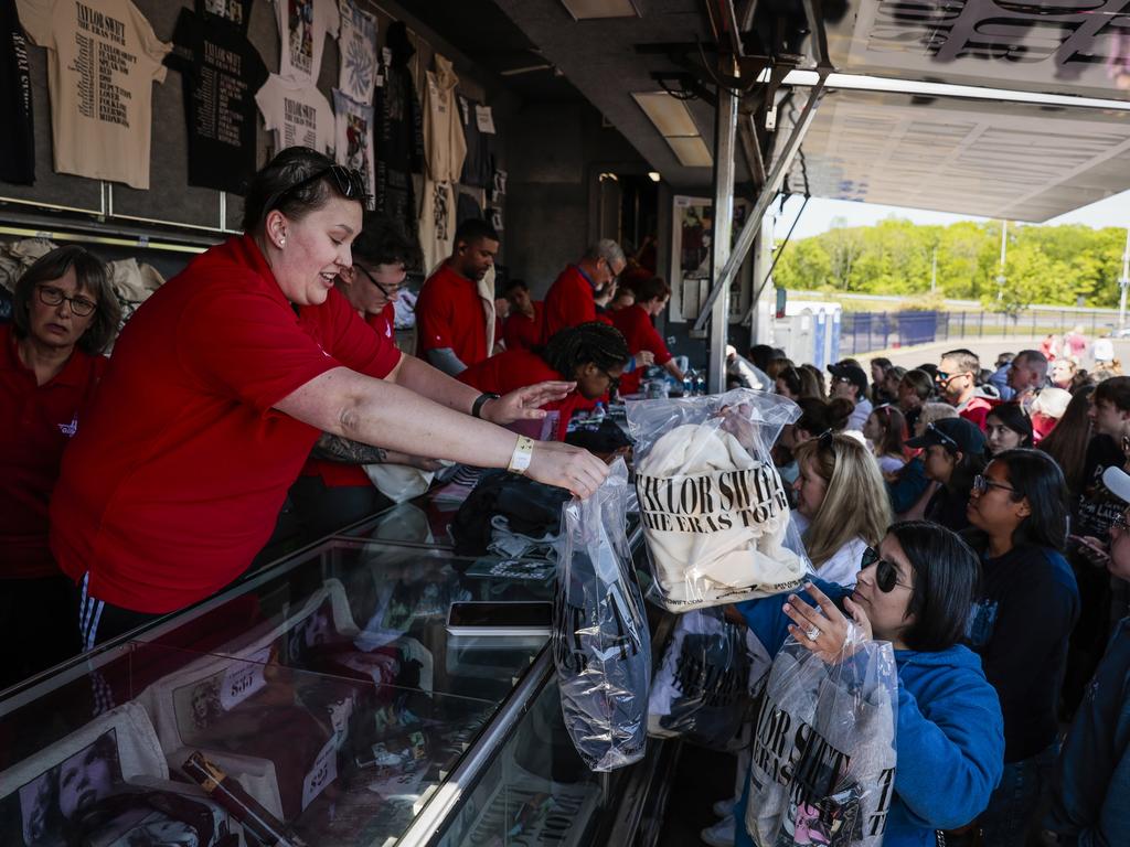 Hundreds stand in line for hours to get their official Taylor Swift merchandise before the pop star's weekend concerts in Massachusetts. Picture: Erin Clark/The Boston Globe via Getty Images