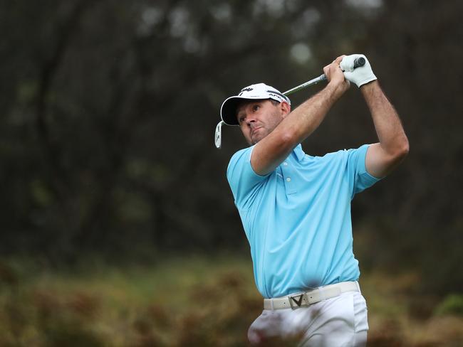 Former Australian cricket captain Ricky Ponting tees off on the 2nd hole during the Australian Open pro-am at The Australian Golf Club, Sydney. Picture: Brett Costello