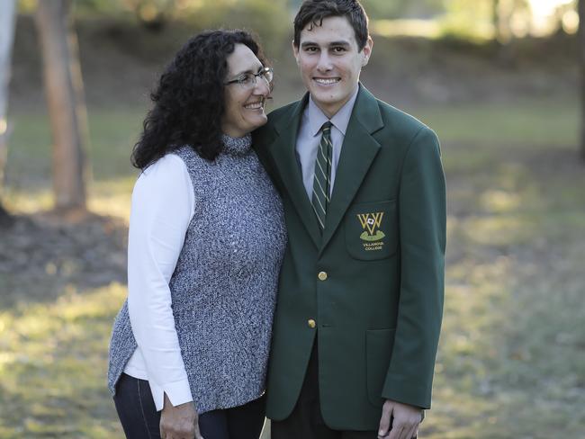 16-year-old Theodore Day has multiple serious food allergies and has developed debilitating anxiety as a result. Pictured with his mum Maria Day, 52. Photo: Mark Cranitch.