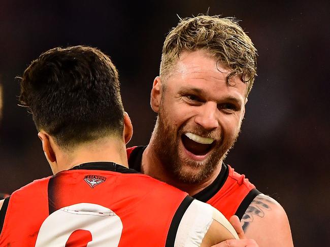 PERTH, AUSTRALIA - AUGUST 17: Jake Stringer and Dylan Shiel of the Bombers celebrates after scoring a goal during the 2019 AFL round 22 match between the Fremantle Dockers and the Essendon Bombers at Optus Stadium on August 17, 2019 in Perth, Australia. (Photo by Daniel Carson/AFL Photos via Getty Images)