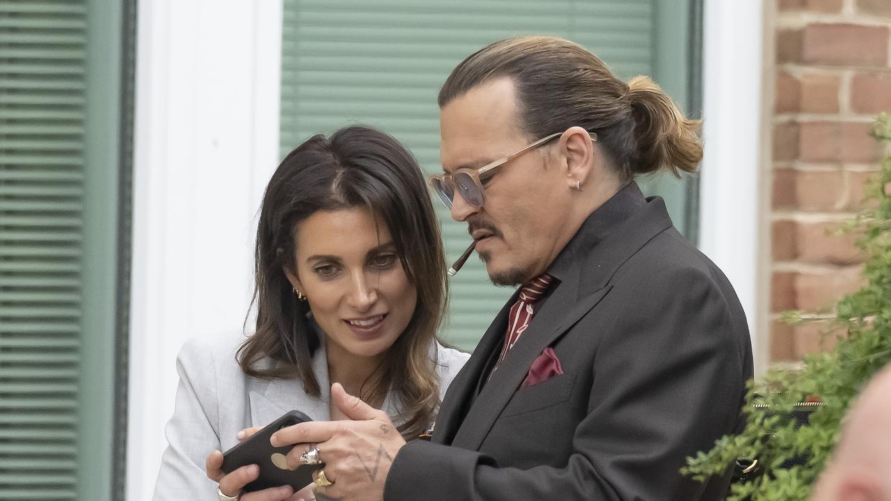 Johnny Depp and lawyer Joelle Rich outside court. (Photo by Ron Sachs/Consolidated News Pictures/Getty Images)