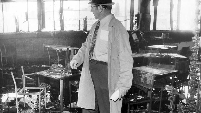 Inspector L Bardwell of CIB Forensic Science inside bombed Whiskey Au Go Go nightclub, Brisbane in 1973.