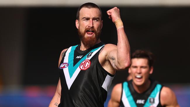 Dixon celebrates one of his six goals against the Eagles. (Photo by Chris Hyde/Getty Images)