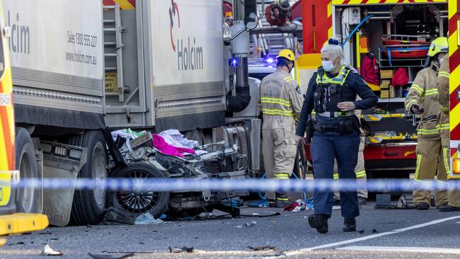 Police inspect the horror scene. Picture: David Geraghty