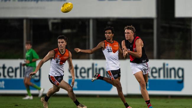 Lucas Edmonds, Adrian Scott and James Auld as the NTFL Buffaloes' mens side beat the Essendon Bombers. Picture: Pema Tamang Pakhrin