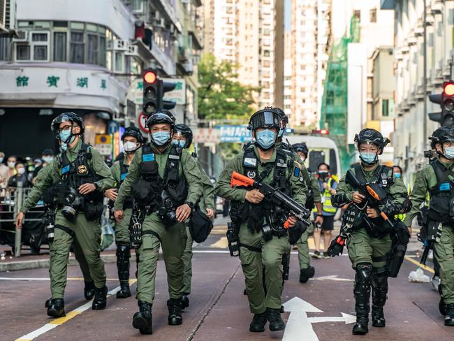 Riot police during protests in 2020. Picture: Anthony Kwan/Getty Images