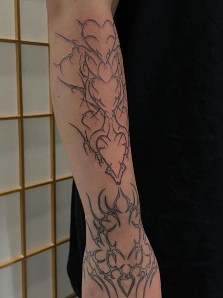 Custom cyber sigil arm piece by Reid. Picture: Instagram