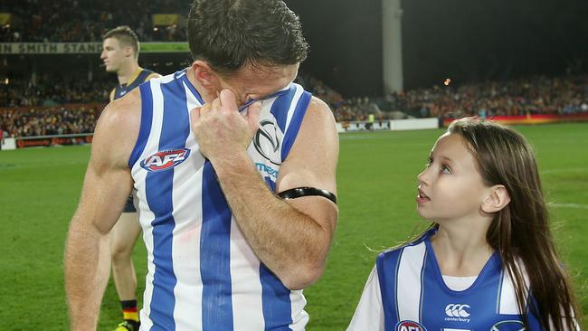 Brent Harvey wipes away tears after playing his last game for North Melbourne. Picture: Michael Klein