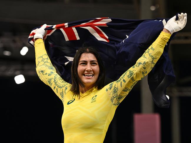 Saya Sakakibara of Australia celebrates after winning the gold medal in the women’s BMX racing final. Picture: Dan Himbrechts/AAP