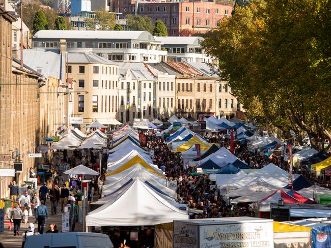 Set among the historic Georgian sandstone buildings of Salamanca Place in Hobart, this famous market attracts thousands of locals and visitors every Saturday of the year.Photo - Alastair BettESCAPE 15 May 2022TOP GEAR