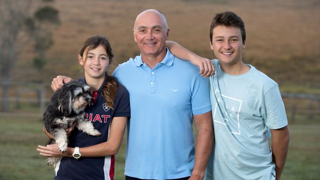 Bella, Garry and Marcus Youngberry at home.