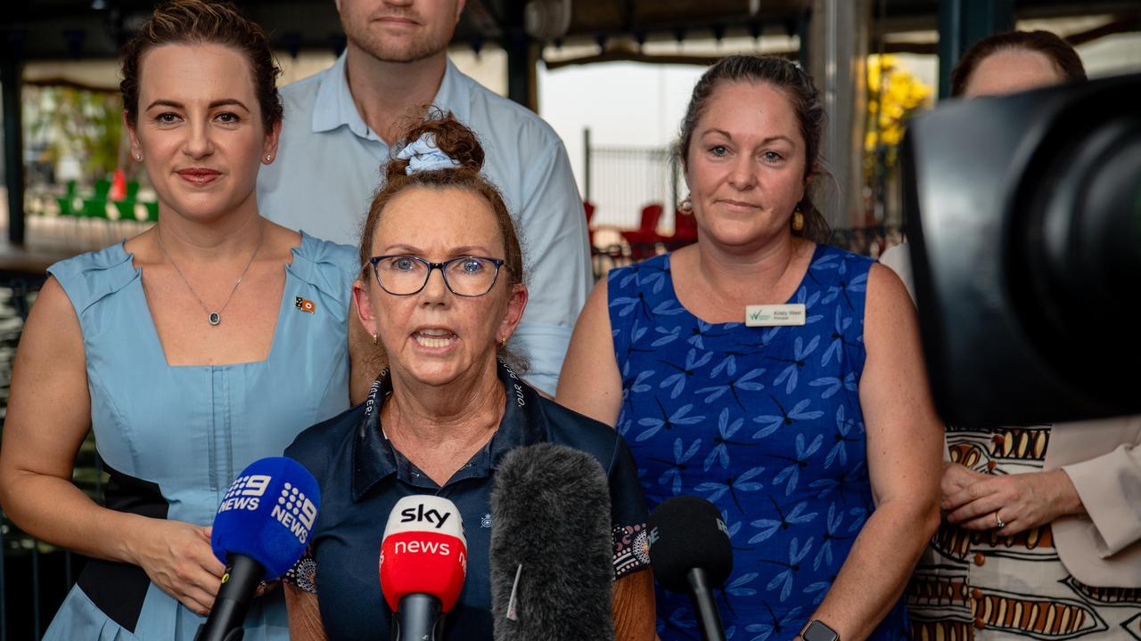 Chief Minister Lia Finocchiaro, Royal Life Saving NT executive director Floss Roberts and Woodroffe Primary School principal Kristy West as swimming lessons for all NT primary school students will be free from 2025. Picture: Pema Tamang Pakhrin