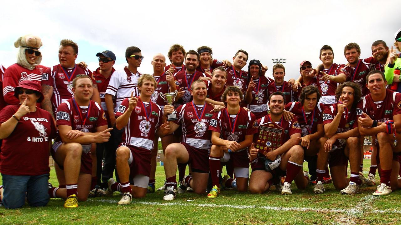 Toowoomba photographer, Paul Ellison at the rugby league grand final. The Millmerran squad celebrates winning the TRL Second Division grand final against Warwick at Clive Berghofer Stadium. Sunday, September 27, 2015. Photo Contributed