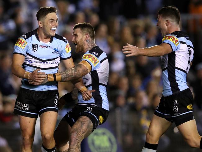 Cronulla's Kyle Flanagan celebrates scoring a try during NRL match Cronulla Sharks v Parramatta Eels at Shark Park. Picture. Phil Hillyard