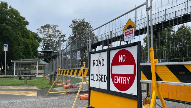 The gantry’s timber supports have been inundated multiple times during floods, including in the near-record 2022 disaster when floodwaters reach only about a dozen centimetres below a 5.4m-high vehicle clearance sign hanging from the walkway.