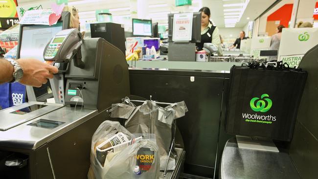 Self-serve checkouts divide shoppers the world over. Picture: Getty