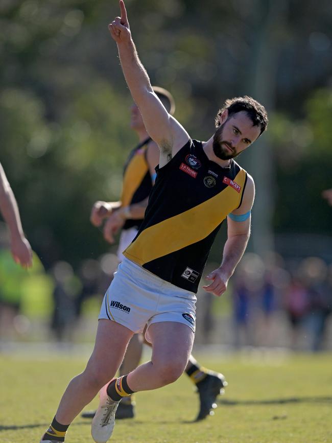 Luke Bunker celebrates a goal for Heidelberg. Picture: Andy Brownbill