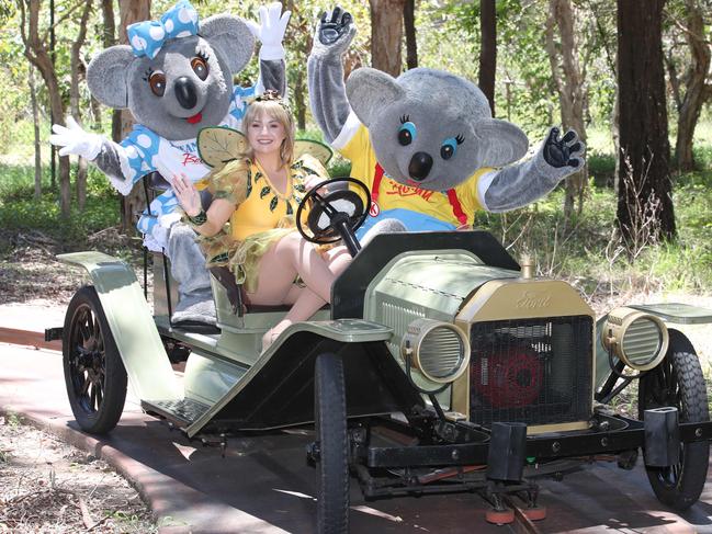 Cooee the Gumnut Fairy drives Kenny and Belinda Koala in the old Model T cars at Dreamworld. The Gold Coast theme park celebrates its 40th anniversary on Wednesday. The classic cars are the last remaining original ride from the 1981 opening. Picture Glenn Hampson