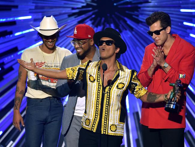 First winners ... Bruno Mars and Mark Ronson accept the Best Male Video award for "Uptown Funk". Picture: Getty