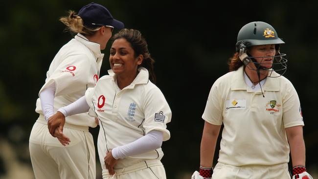 A young Isa Guha celebrates after taking a wicket for England against Australia.