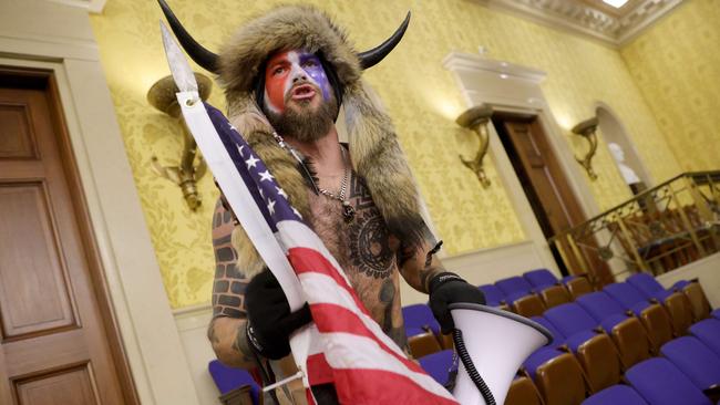 A pro-Donald Trump protester yells inside the US Senate chamber. Picture: Win McNamee/Getty Images