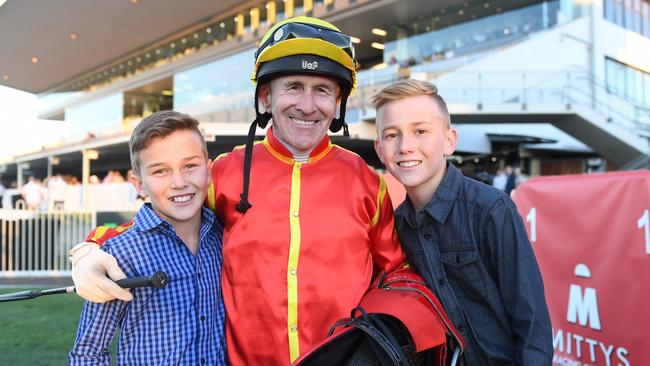 Jeff Lloyd with sons Zac (left) and Jaden after winning the Brisbane Jockeys' Premiership. Picture: Trackside Photography.