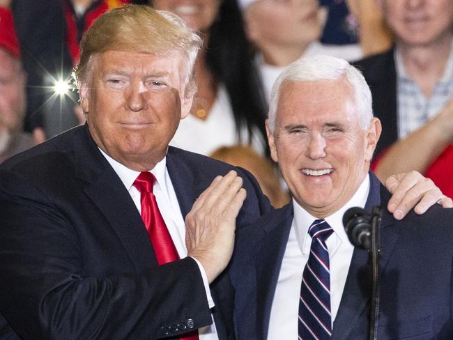 PENSACOLA, FL - NOVEMBER 03: U.S. President Donald Trump and Vice President Mike Pence at a campaign rally at the Pensacola International Airport on November 3, 2018 in Pensacola, Florida. President Trump is campaigning in support of Republican candidates in the upcoming midterm elections.   Mark Wallheiser/Getty Images/AFP == FOR NEWSPAPERS, INTERNET, TELCOS & TELEVISION USE ONLY ==