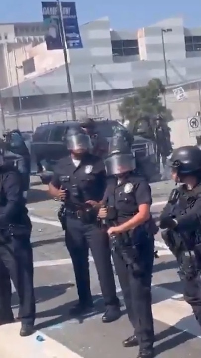 Motorcyclists drive through Police lines during LA protest