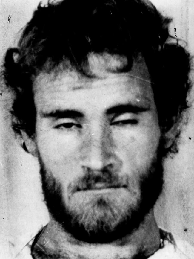 Russell "Mad Dog" Cox in a mugshot in 1983.