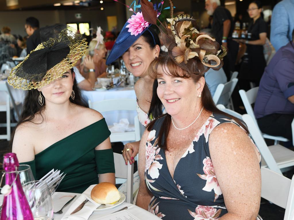 Emily Hubble, Juanita Porter and Karen Duminski at the Darwin Turf Club Bridge Toyota Ladies' Day / Derby Day. Picture: KATRINA BRIDGEFORD