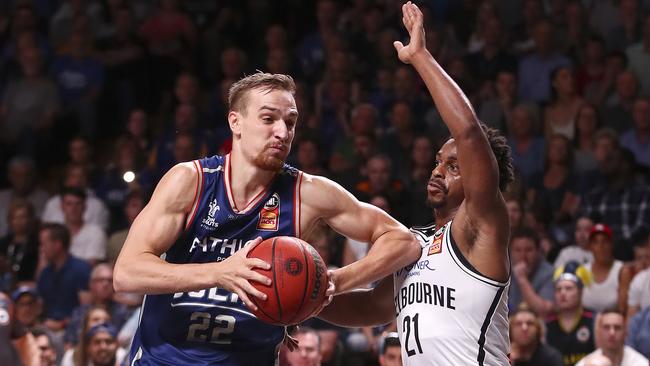 Anthony Drmic drives on Casper Ware. Picture: SARAH REED