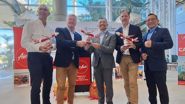 Left to right, Cairns Airport Chief Executive Officer Richard Barker, Tourism Minister Michael Healy,Indonesia AirAsia spokesperson Eddy Soemawilaga, Head of Indonesia Affairs and Policy,Tourism Tropical North Queensland Chief Executive Officer Mark Olsen and Indonesian Consul General in Sydney, Vedi Kurnia Buana. Photo: Supplied AirAsia