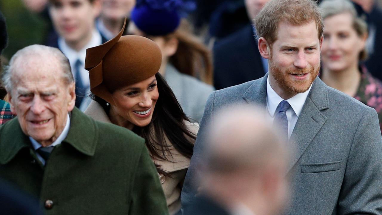 Prince Philip with Meghan and Harry in 2017. Picture: Adrian Dennis/AFP