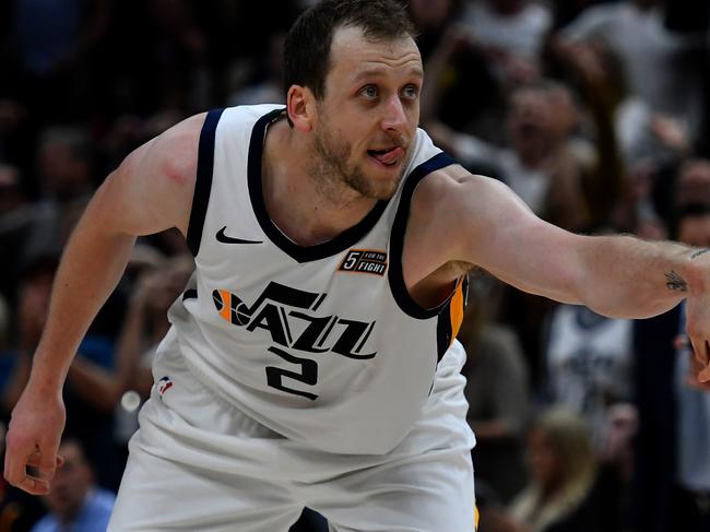 SALT LAKE CITY, UT - OCTOBER 19: Joe Ingles #2 of the Utah Jazz reacts to his three point basket in the second half of a NBA game against the Golden State Warriors at Vivint Smart Home Arena on October 19, 2018 in Salt Lake City, Utah. NOTE TO USER: User expressly acknowledges and agrees that, by downloading and or using this photograph, User is consenting to the terms and conditions of the Getty Images License Agreement.   Gene Sweeney Jr./Getty Images/AFP == FOR NEWSPAPERS, INTERNET, TELCOS & TELEVISION USE ONLY ==