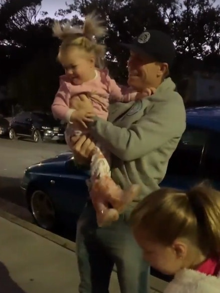 Warner gives his girls a cuddle. Picture:, Candice Warner Instagram