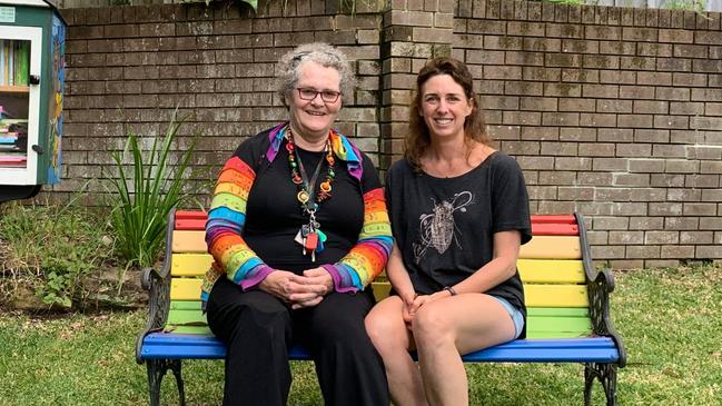 Resident Andy Bloom (right) pictured outside her home with a fellow resident.