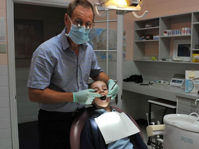 Dentist Dr Brendan White will return to limited services next week with more protection in place