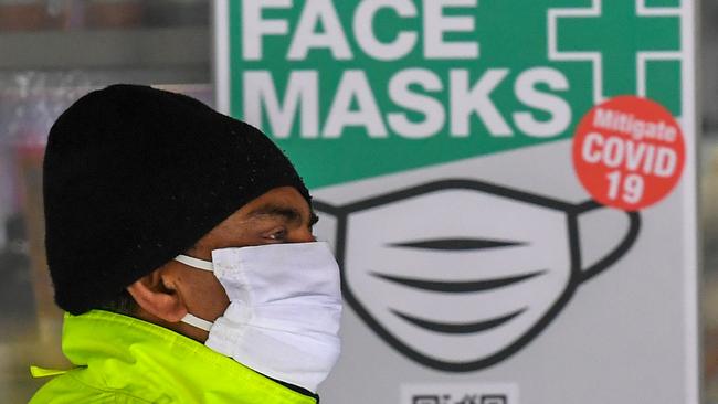 As mask wearing becomes compulsory in Melbourne, free pandemic kits will be distributed in two locations. Picture: AFP