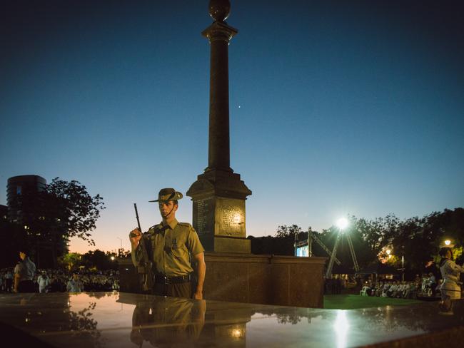 Darwin gathers for the ANZAC Day dawn service at the cenotaph.Pic Glenn Campbell