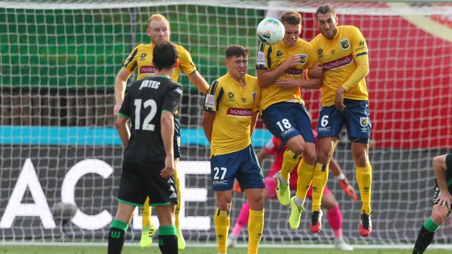 Central Coast Mariners block a shot on goal at Central Coast Stadium on Sunday Picture: Getty images