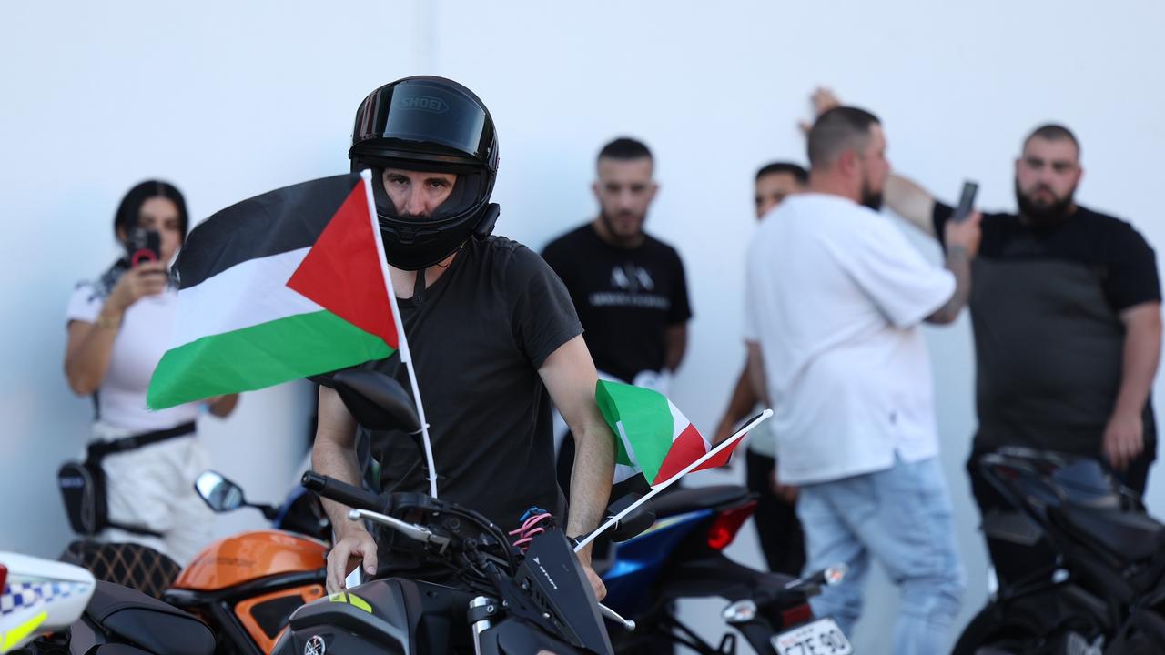 The riders were escorted by police, and they had a tense standoff with Israel supporters on arrival at Coogee. Picture: NCA NewsWire/ Dylan Robinson