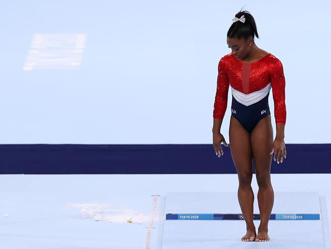 TOKYO, JAPAN - JULY 27: Simone Biles of Team United States competes on vault during the Women's Team Final on day four of the Tokyo 2020 Olympic Games at Ariake Gymnastics Centre on July 27, 2021 in Tokyo, Japan. (Photo by Jamie Squire/Getty Images)