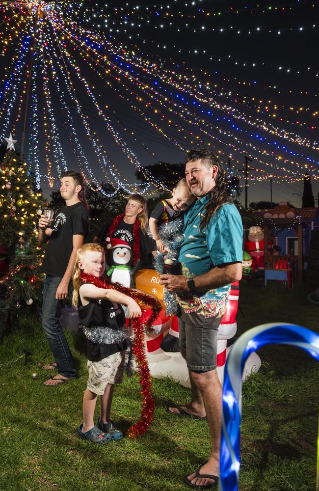 Mulletfest 2023 family category winners (from left) Alex Paynter, Theodore Berghofer, Ryan Williams, Cruise Nicol and Brett Paynter at the Warwick St Christmas lights display of the Paynter family. Picture: Kevin Farmer