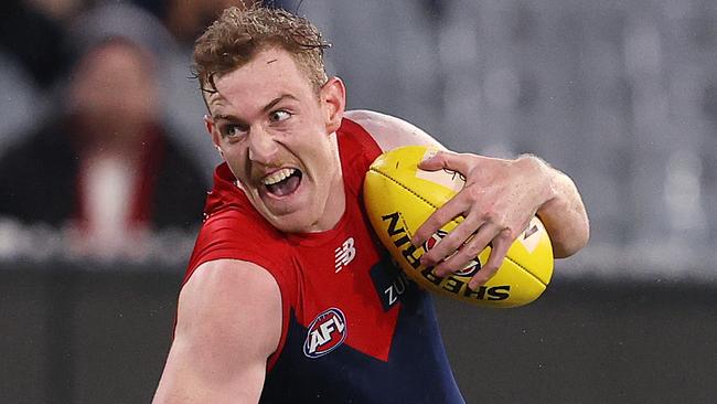 AFL Round 8.   08/05/2021. Melbourne vs Sydney Swans at the MCG, Melbourne.   Harrison Petty of the Demons tackled by Sydneys Tom Papley during the 3rd qtr.   . Pic: Michael Klein