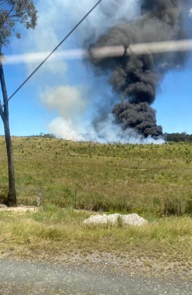 Police and fire crews were called to a fire off of the Old Pacific Hwy in Pimpama around 10.50am on Friday. Photo: Philip Clynes/Facebook