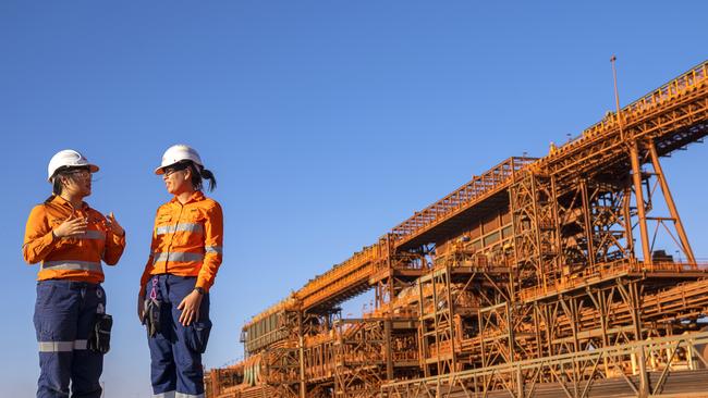 Engineer Reita Guo and Technical Specialist Annaleise Prowse at BHP’s Jimblebar iron ore mine in the Pilbara region, Western Australia. Photo taken by Evan Collis in November 2020.